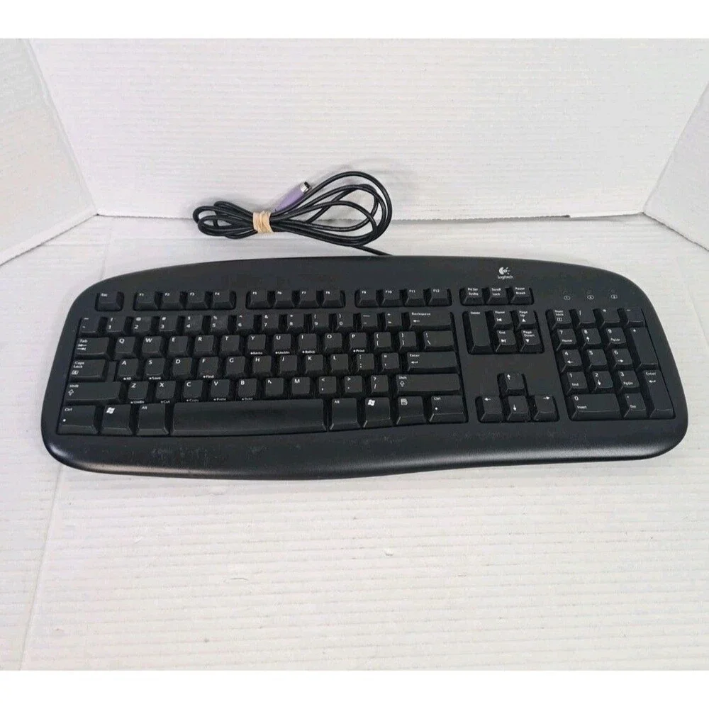 Logitech Wired Deluxe Keyboard Y-SU61 Black PS/2 Purple Connector PN 867462-0403